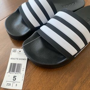 Men’s Size 5, Women’s Size 6  Adidas Adilette slides. Brand new with tags.